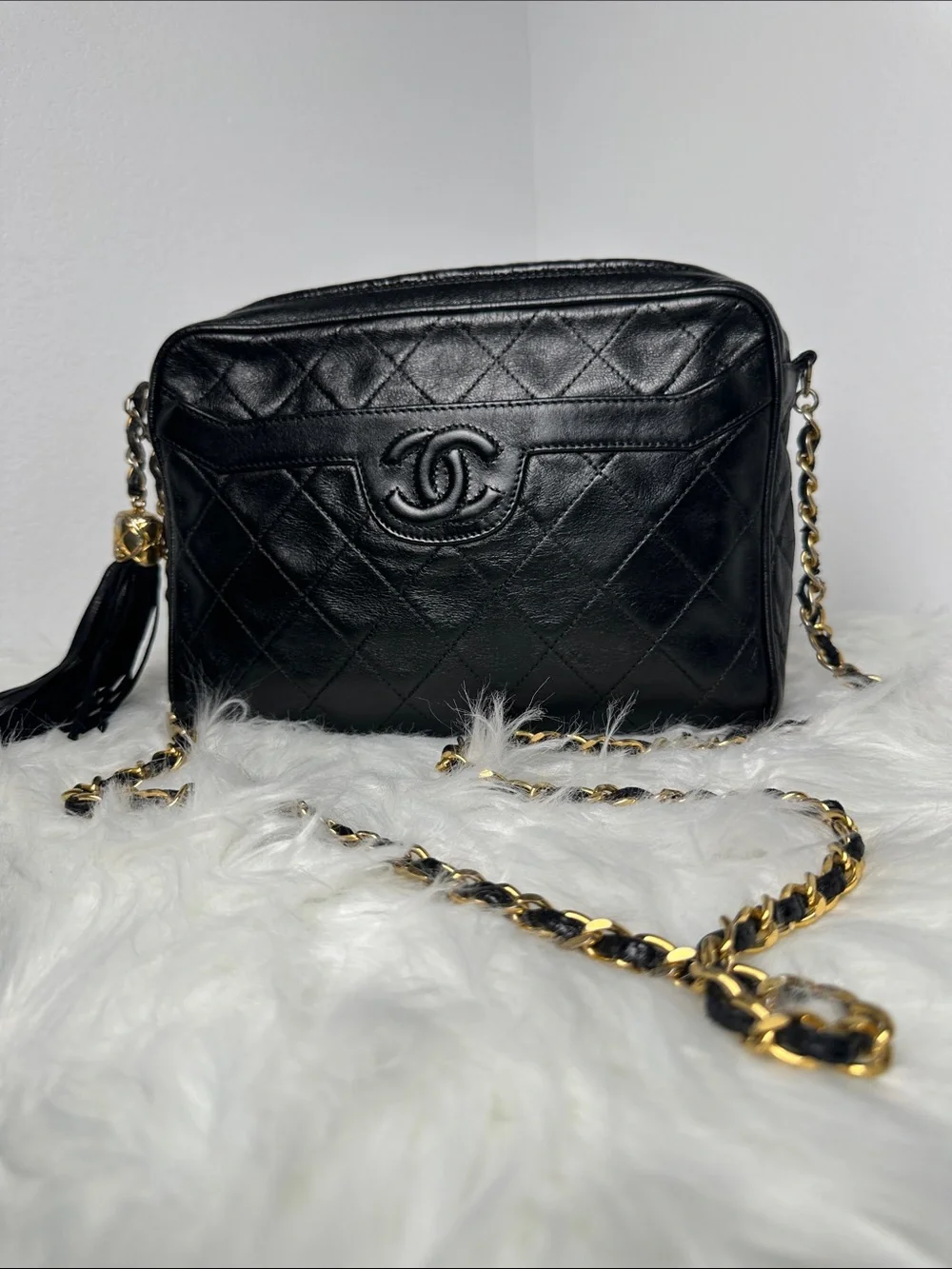 CHANEL Black Quilted Lambskin Crossbody with Tassel and Chain
